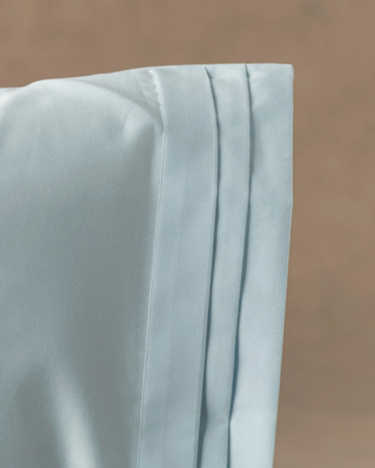 Tailored pleats, hidden closures