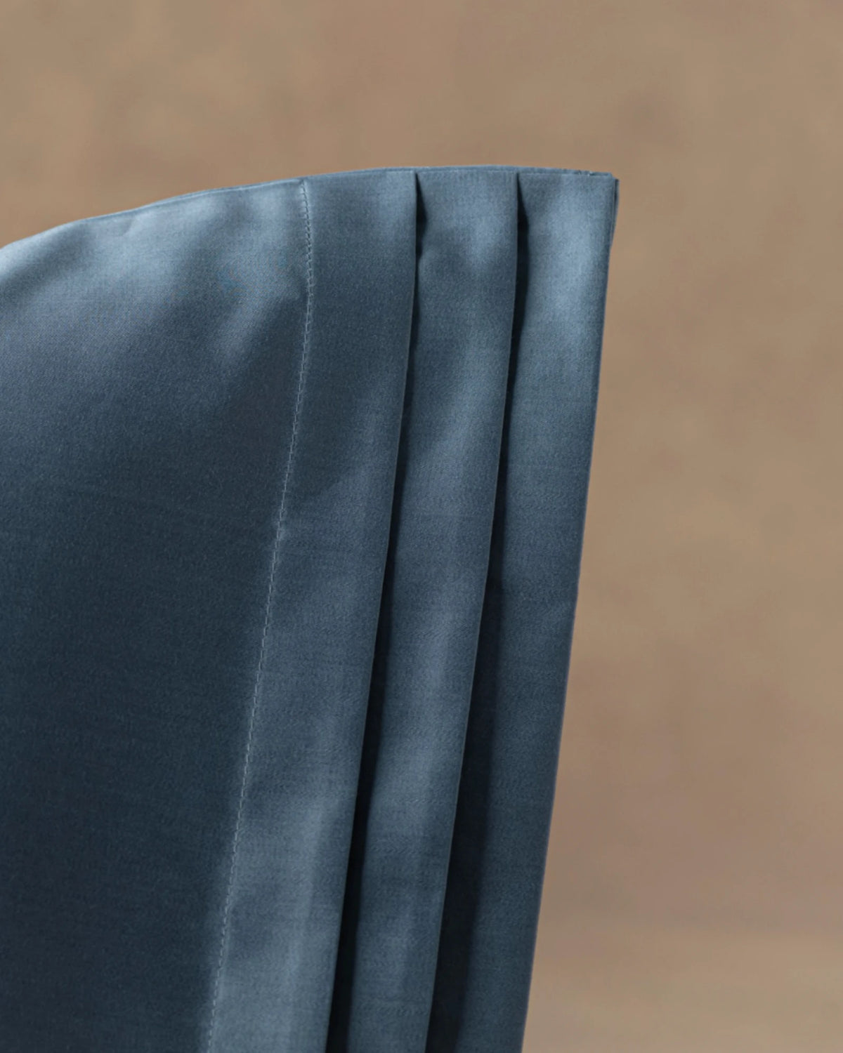 Tailored pleats, hidden closures